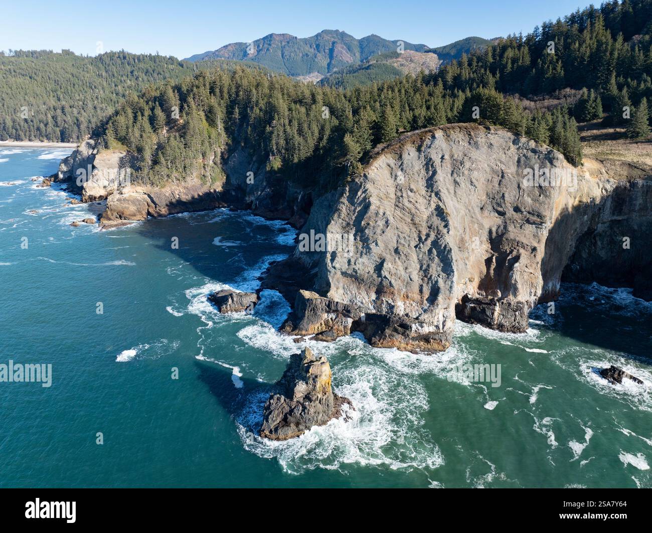 The Pacific Ocean bathes the rugged yet incredibly scenic coastline of northern Oregon. This wild and beautiful area is accessible via highway 101. Stock Photo