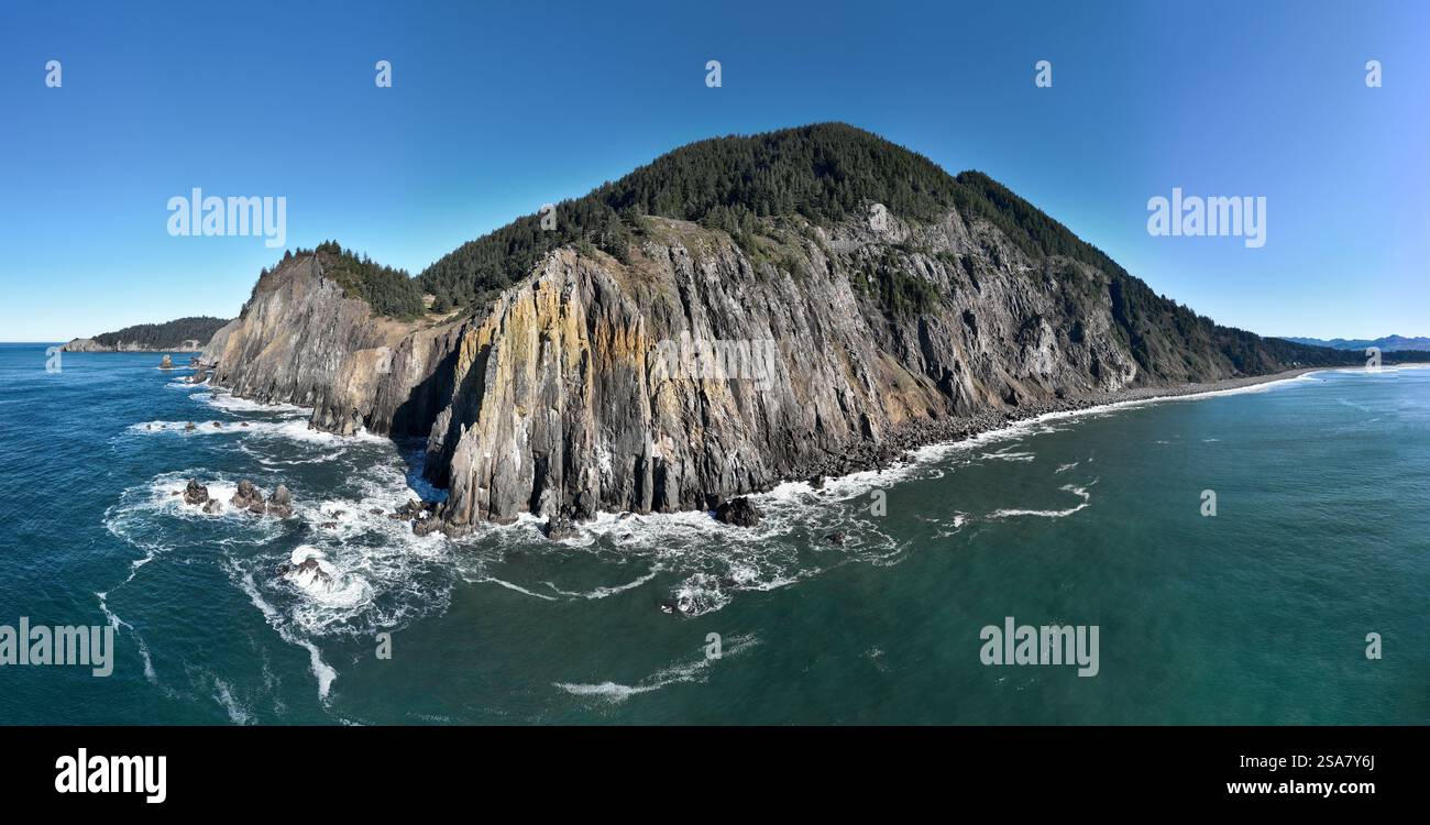 The Pacific Ocean bathes the rugged yet incredibly scenic coastline of northern Oregon. This wild and beautiful area is accessible via highway 101. Stock Photo