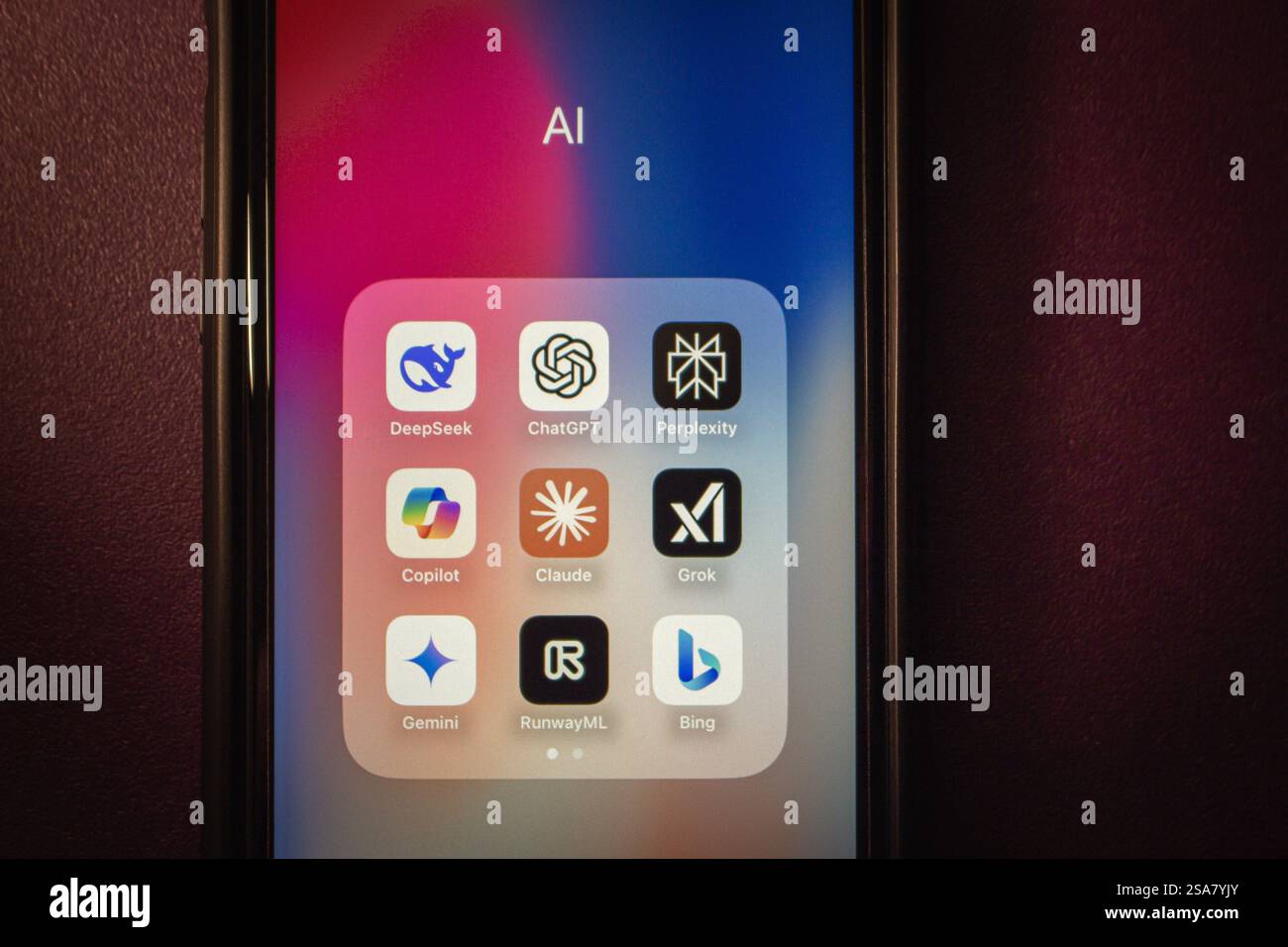 DeepSeek and other AI service icons (ChatGPT, Claude, Grok, etc) are displayed in dark mood. Artificial intelligence and generative AI concept. Stock Photo