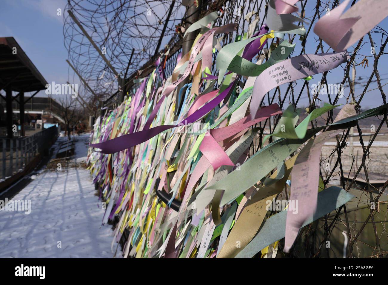 Lunar New Year, South Korea Tributes attached to a security fence in