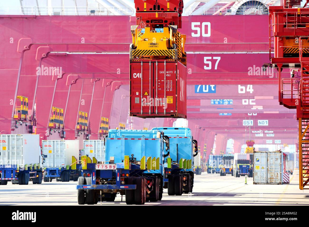 QINGDAO, CHINA - JANUARY 29, 2025 - Cargo ships load and unload foreign ...