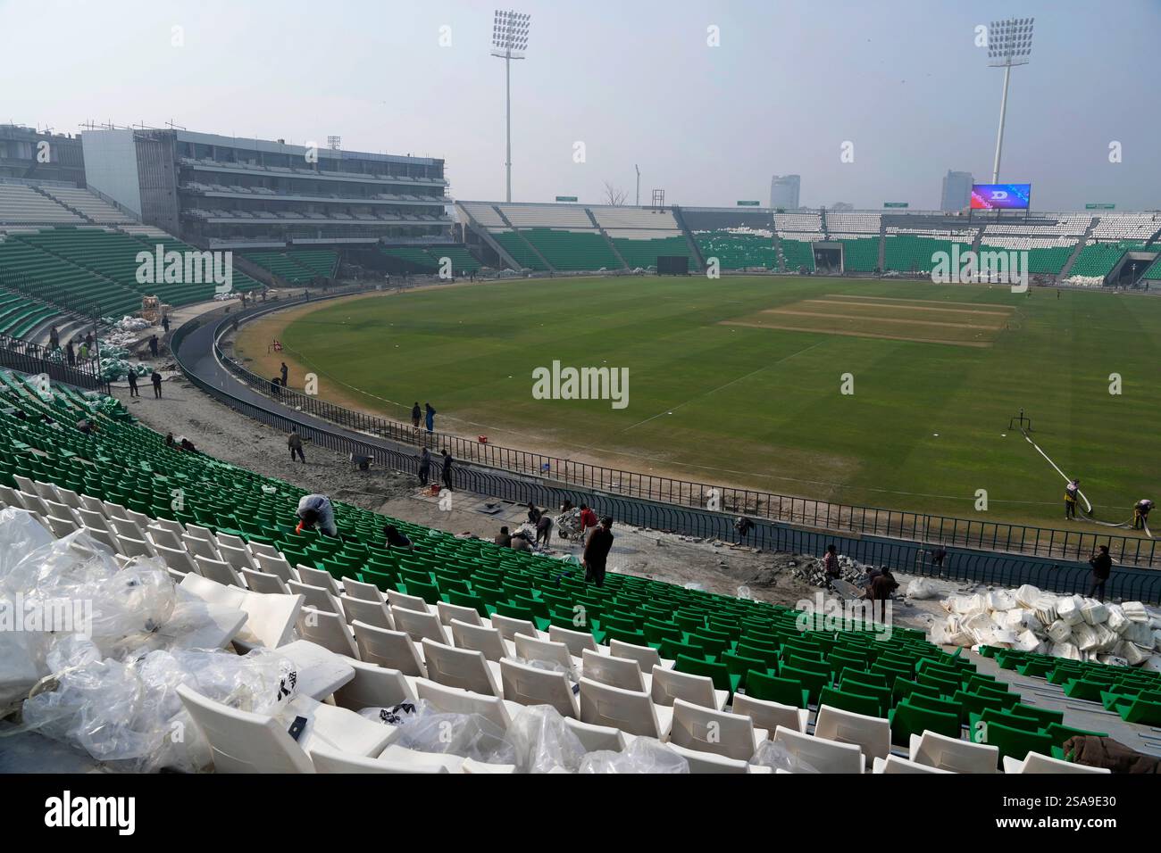 Labourers work to finalise an enclosure during renovation of the