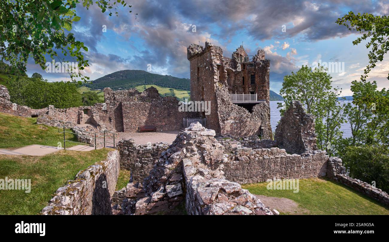 Picturesque ruins of the 13th century Urquhart Castle Ruins, Loch Ness, Scotland. The castle, situated on a headland overlooking Loch Ness, Stock Photo