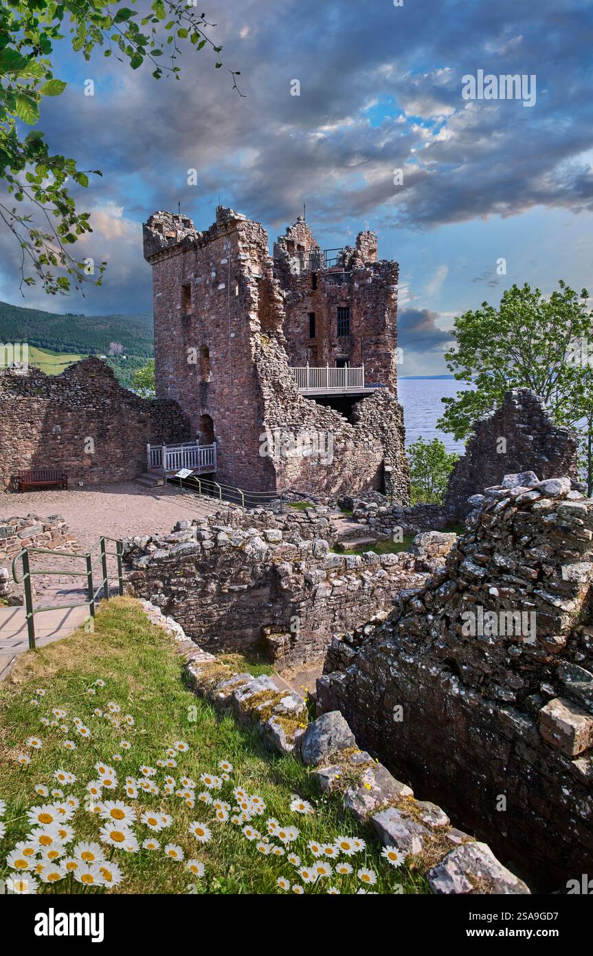 Picturesque ruins of the 13th century Urquhart Castle Ruins, Loch Ness, Scotland. The castle, situated on a headland overlooking Loch Ness, Stock Photo