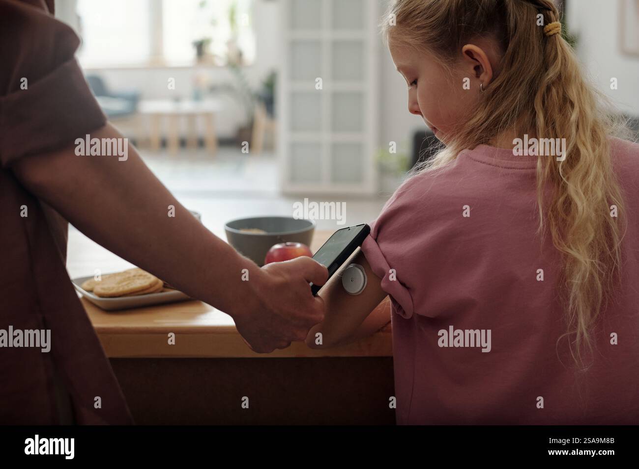 Mother Checking Glucose Levels Of Child With Diabetes Stock Photo Alamy Mother checking glucose levels of child with diabetes stock photo alamy