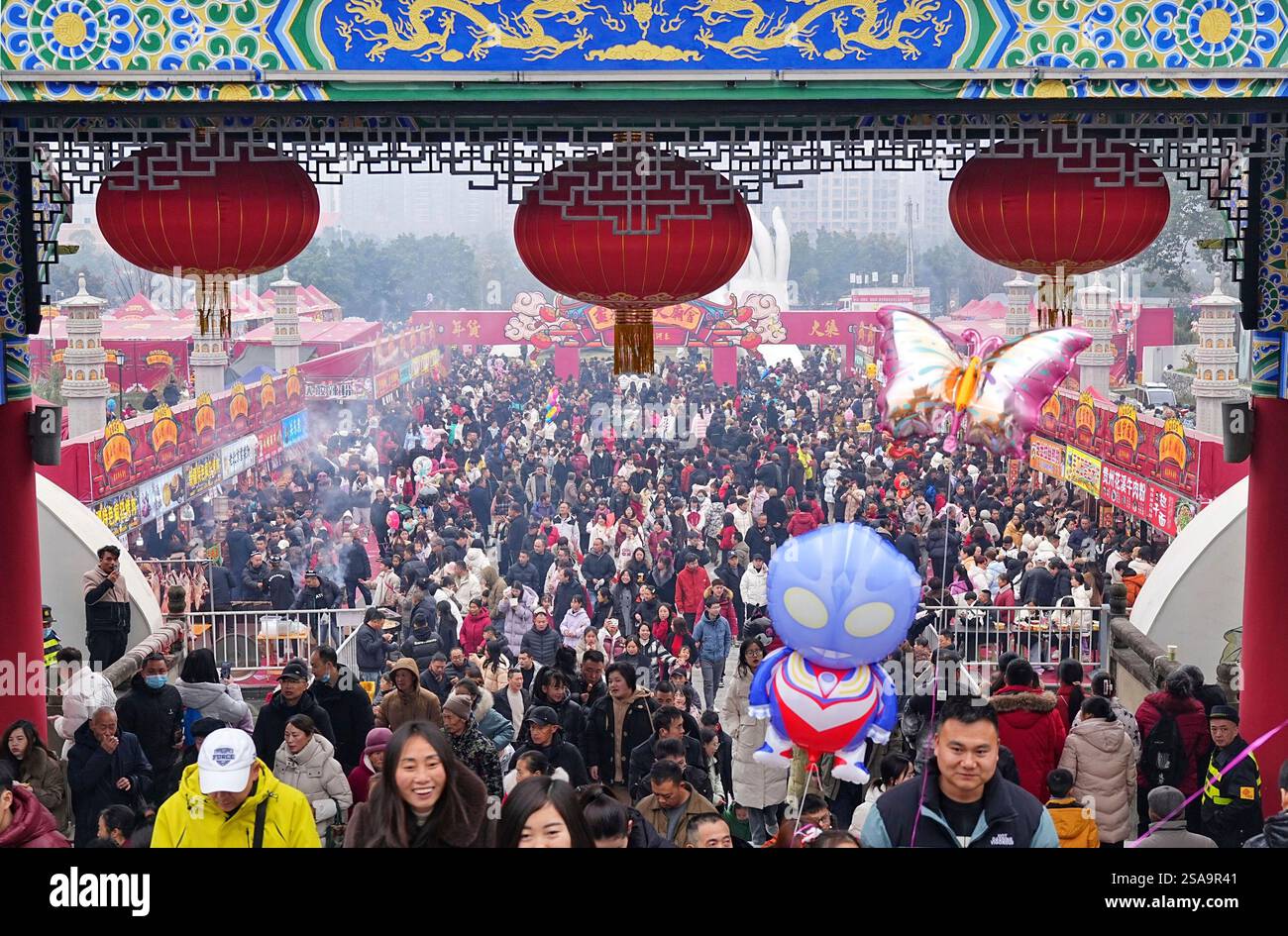 Citizens come to a Spring Festival temple fair in Suining city in