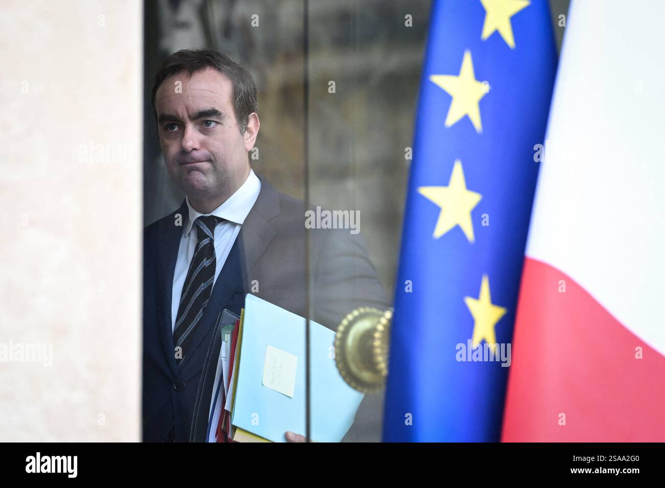 French Minister for the Armed Forces Sebastien Lecornu walks inside the ...