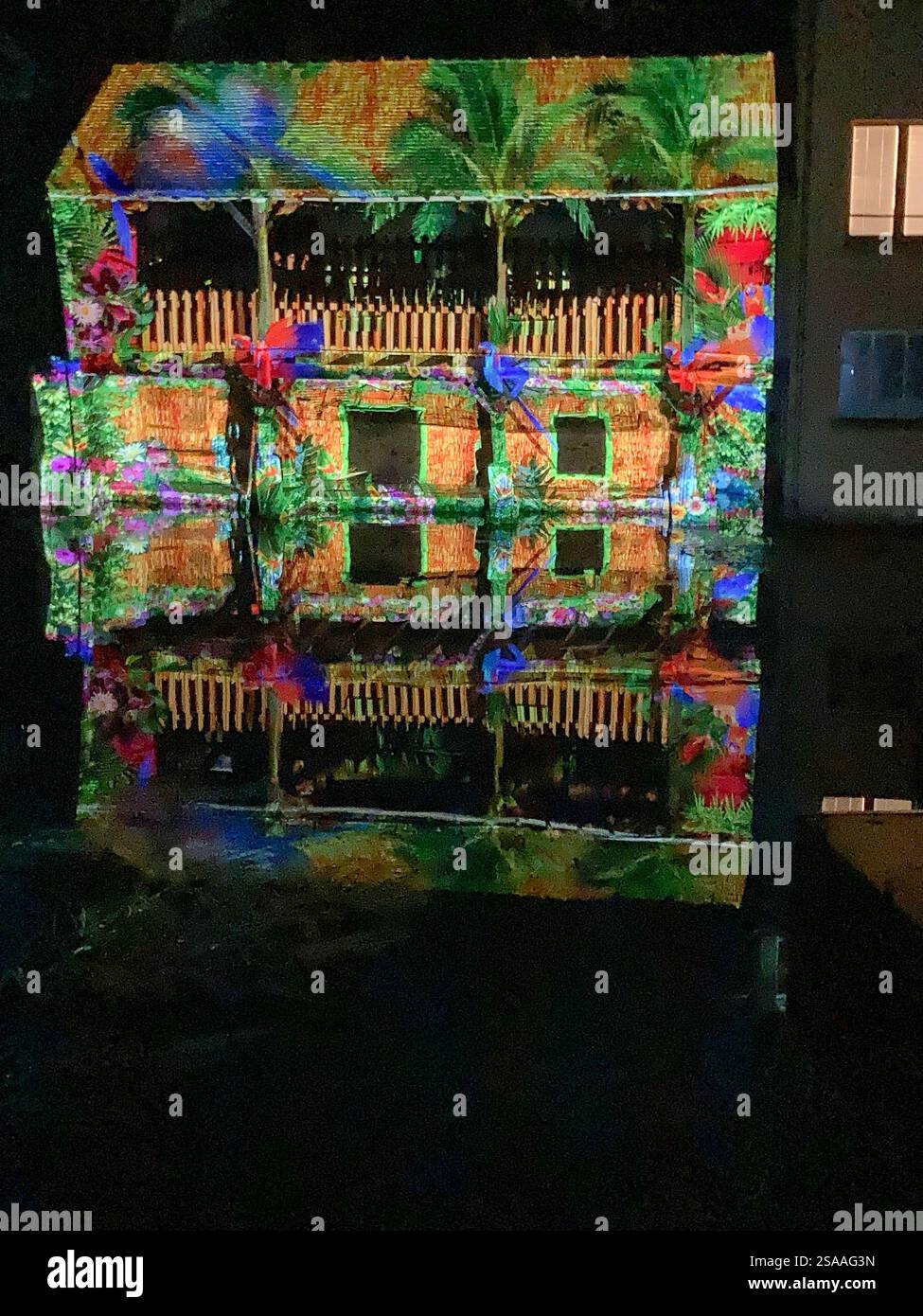 Foulerie wash house, on the River Eure lit-up during the Chartres en lumières' light show 2024 - Smartphone Captured Stock Image Foulerie wash house, on the River Eure lit-up during the Chartres en lumières' light show 2024 - Smartphone Captured Stock Image