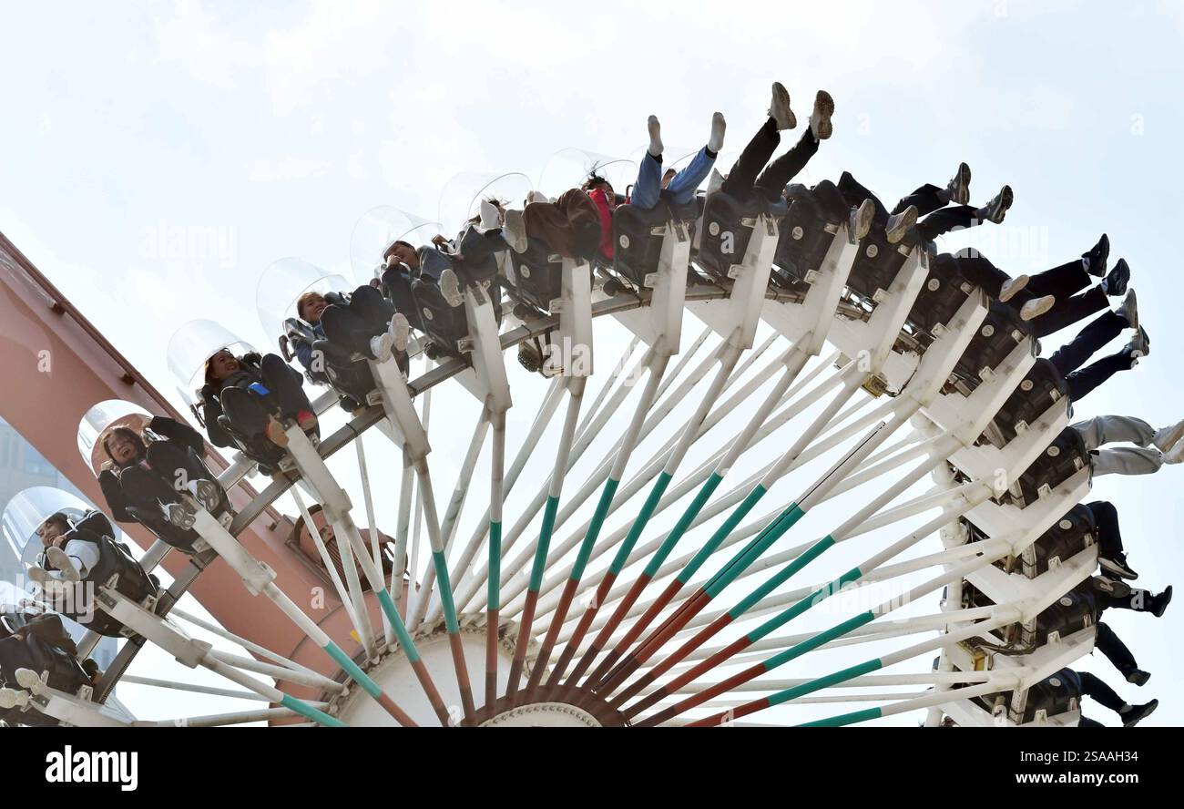 Lunar New Year celebrations in Korea Visitors enjoying a fun fair ride