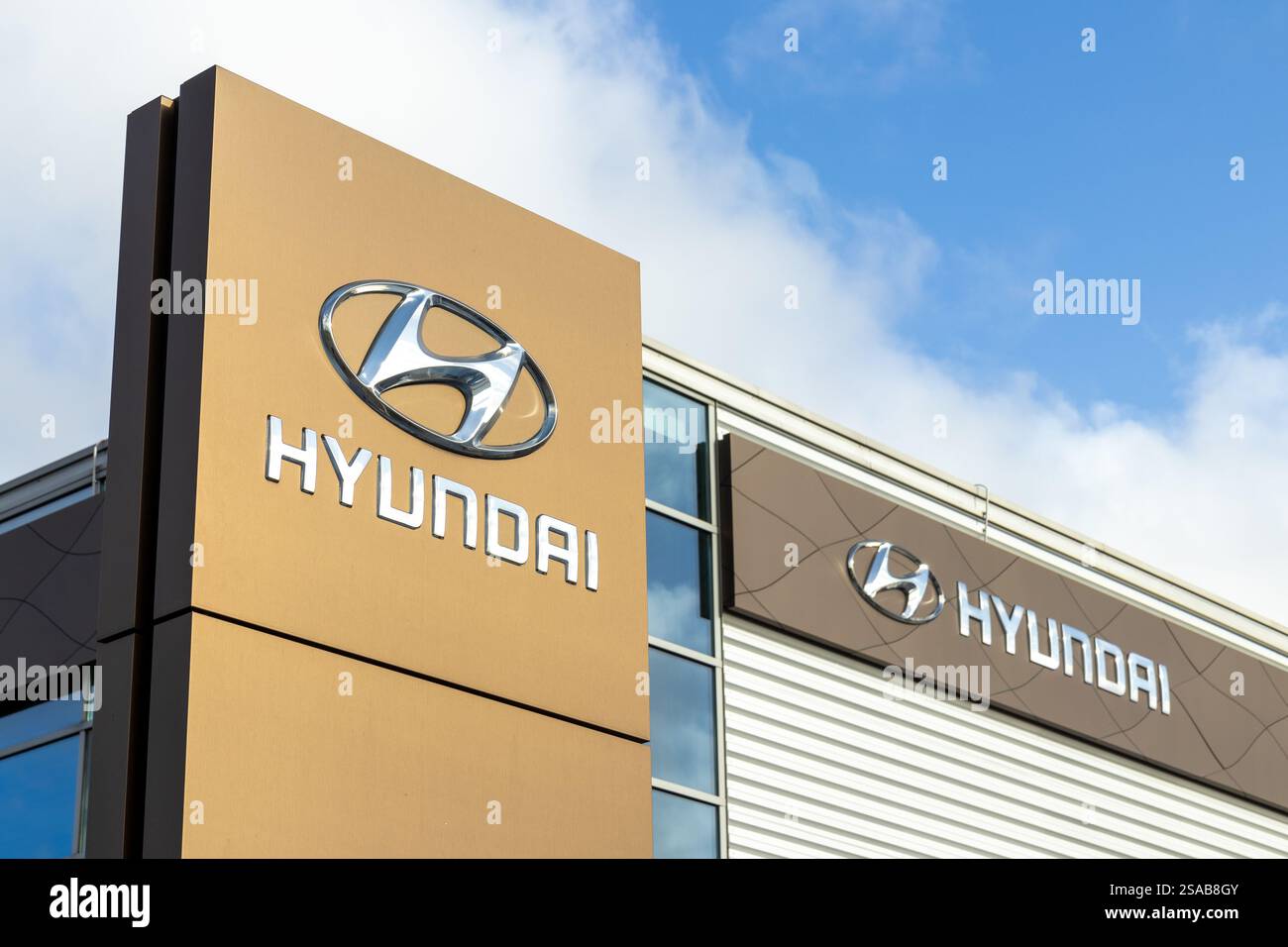 Hyundai logo at the car dealer store in Utrecht. Hyundai, is a South ...