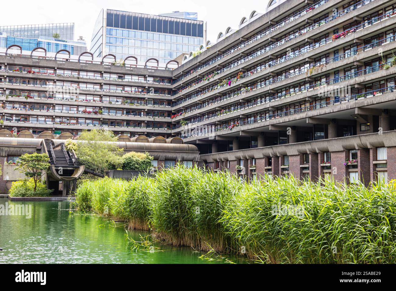 Barbican Centre London Brutalist Architecture With Urban Greenery And 