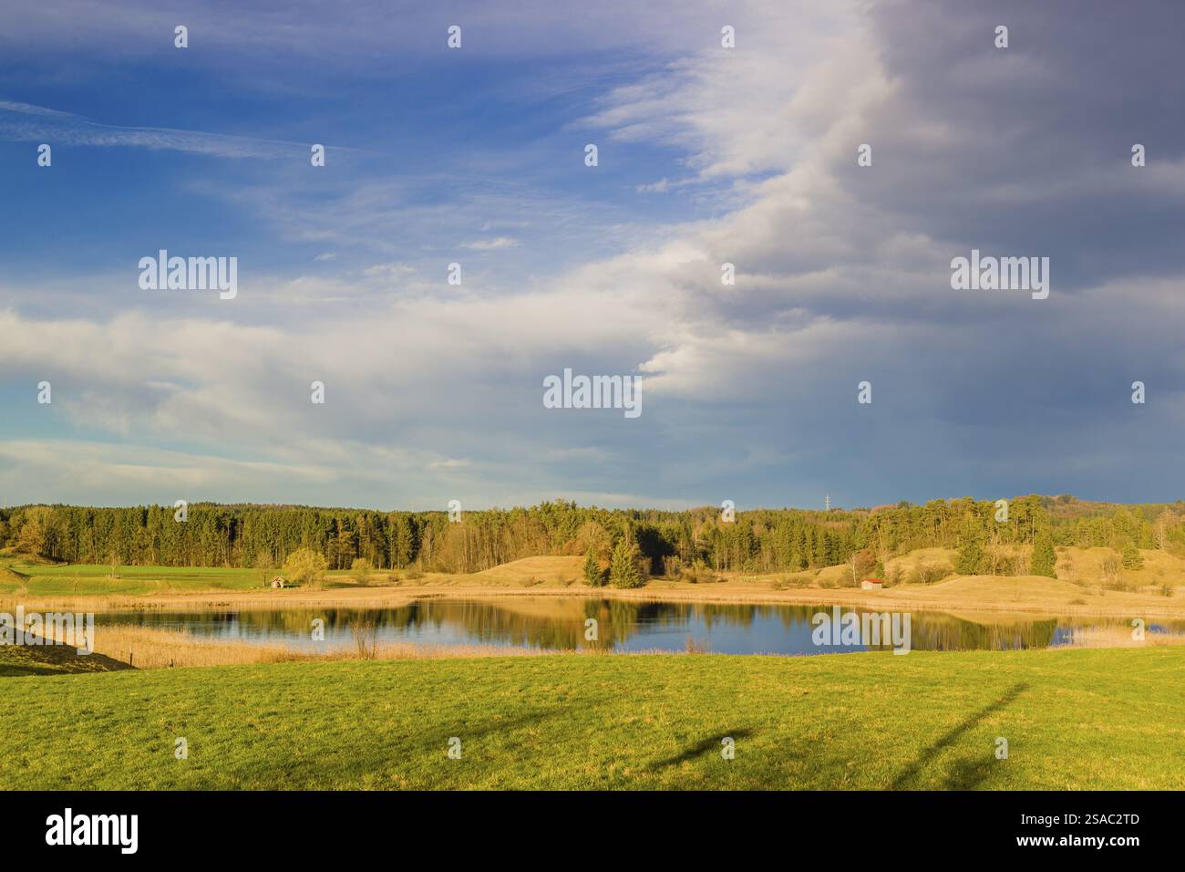 Lake Fohnsee of the Ostersee-group in early morning light Stock Photo ...