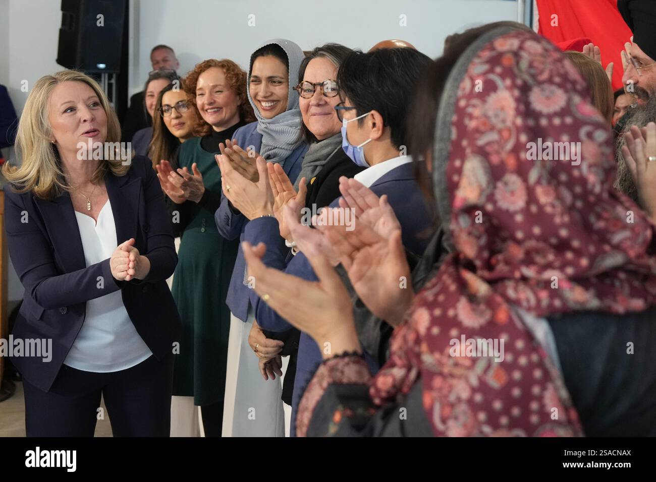 Ontario NDP Leader Marit Stiles greets candidates as she arrives to
