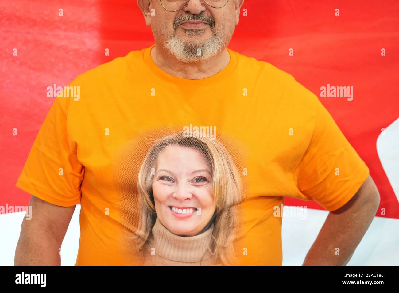 A NDP supporter wears a Tshirt bearing a photo of Ontario NDP Leader