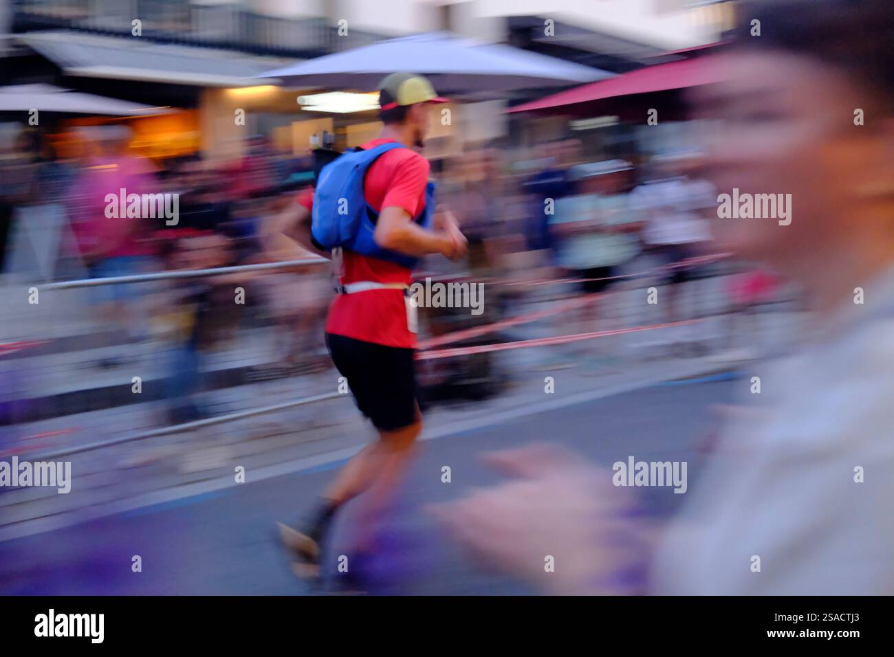 UTMB runner passing through Saint-Gervais. The Ultra tour du Mont Blanc ...