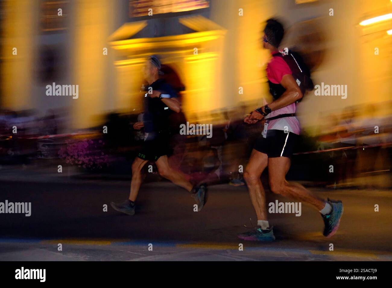 UTMB runner passing through Saint-Gervais. The Ultra tour du Mont Blanc ...