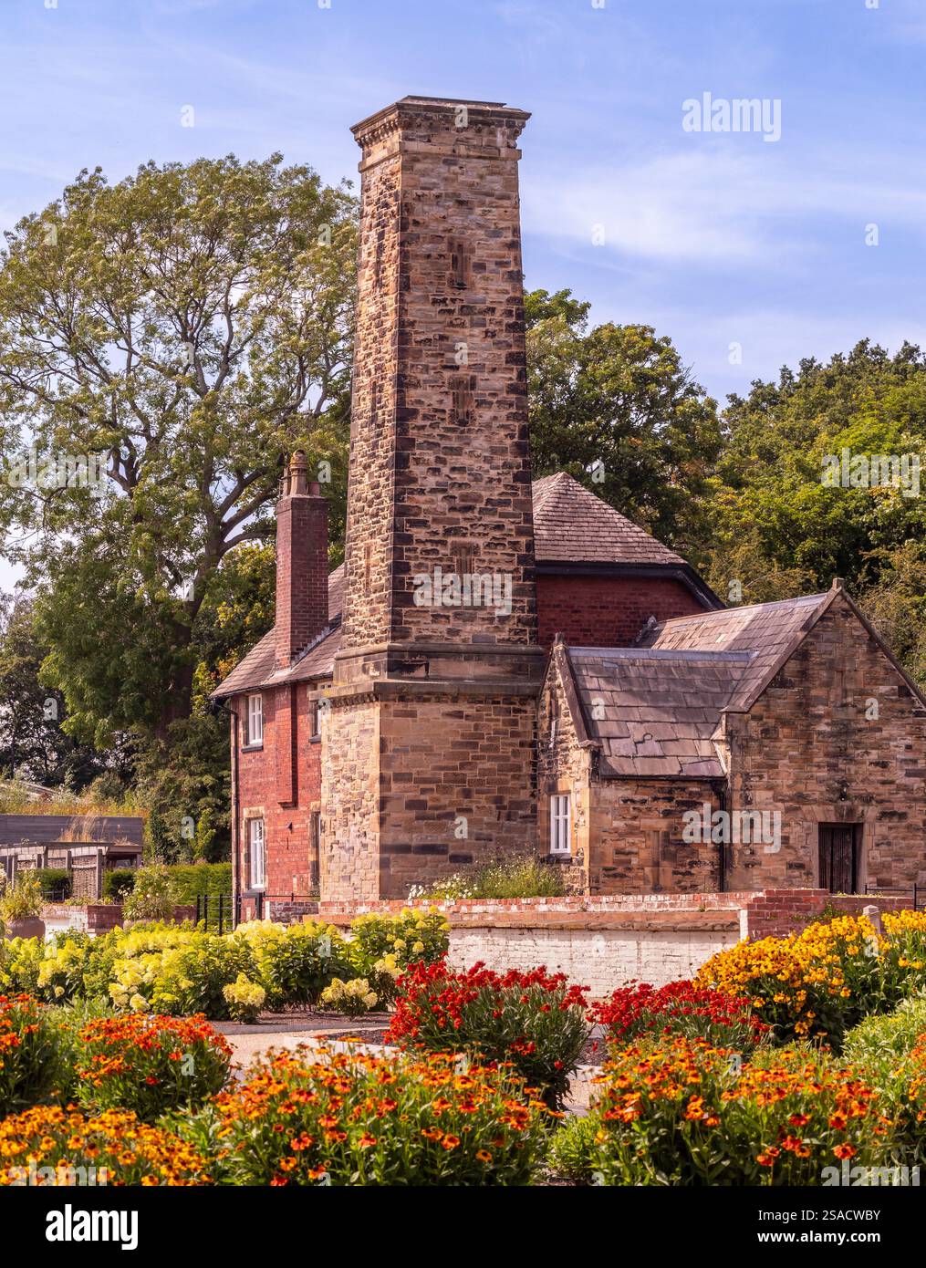 Boiler house and chimney in The Bothy at RHS Bridgewater on a sunny day. Salford. UK Stock Photo