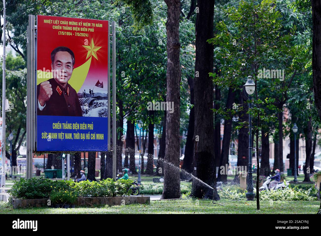 Vietnamese propaganda poster on the street.Celebration of the military ...