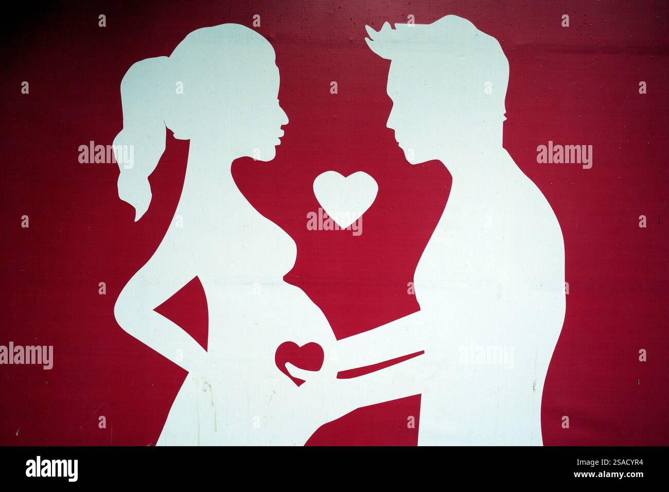 Vietnamese propaganda poster on the street. Campaign for birth rate. Ho ...