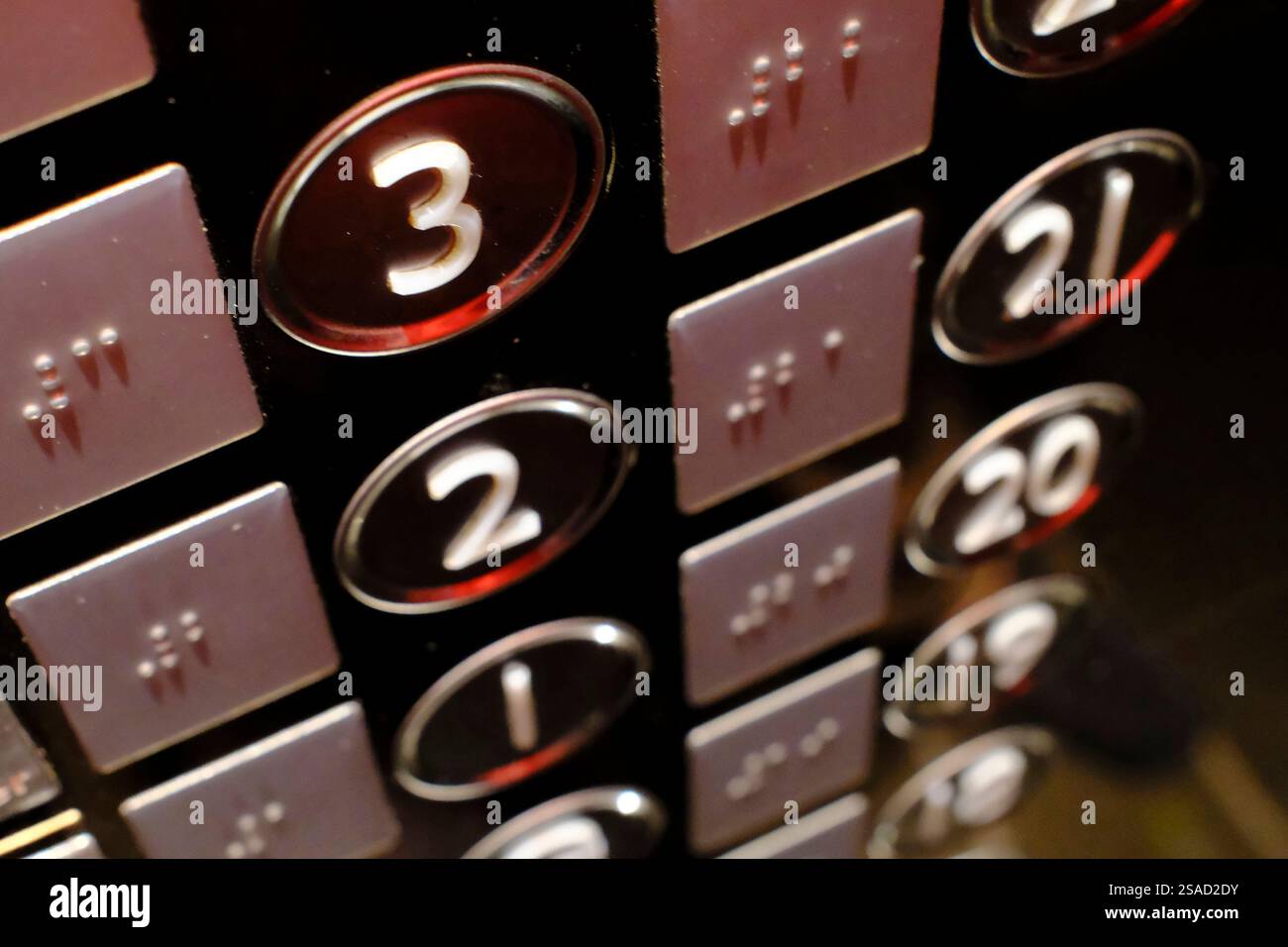 Button in the elevator with Braille code for blind people Stock Photo ...
