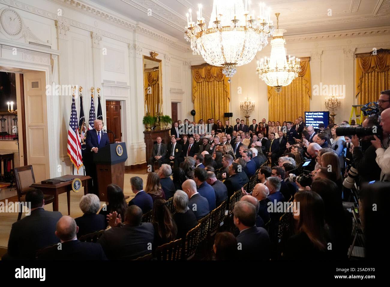 President Donald Trump speaks before signing the Laken Riley Act in the ...