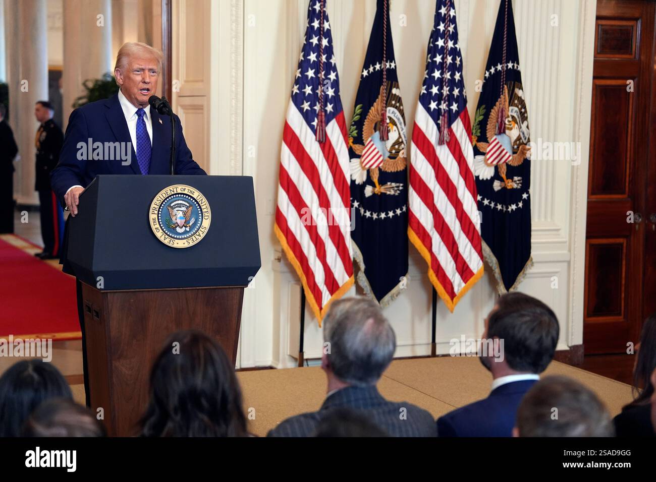 President Donald Trump speaks before signing the Laken Riley Act in the ...