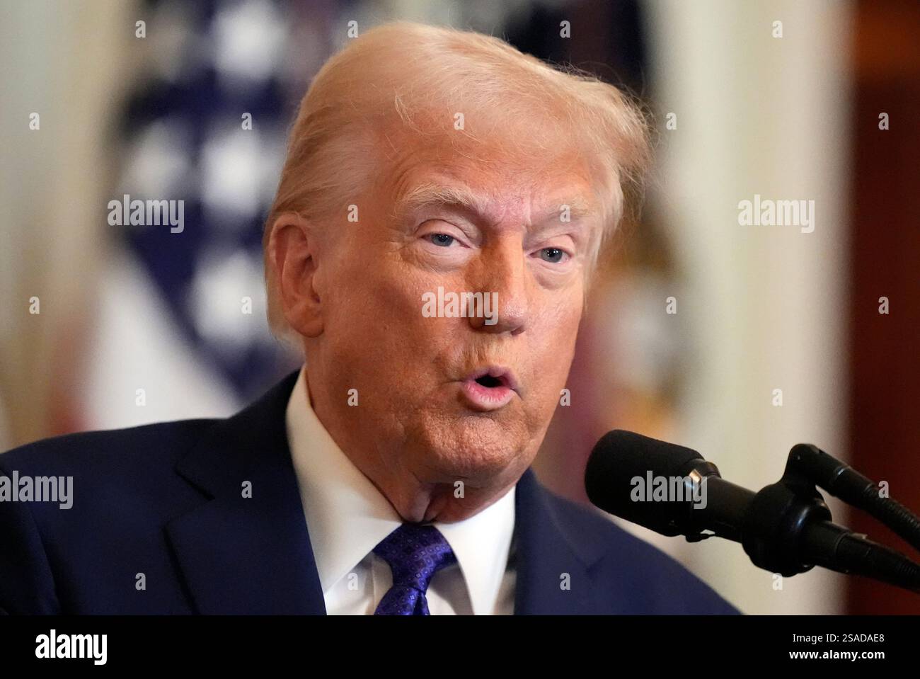 President Donald Trump speaks before signing the Laken Riley Act in the ...