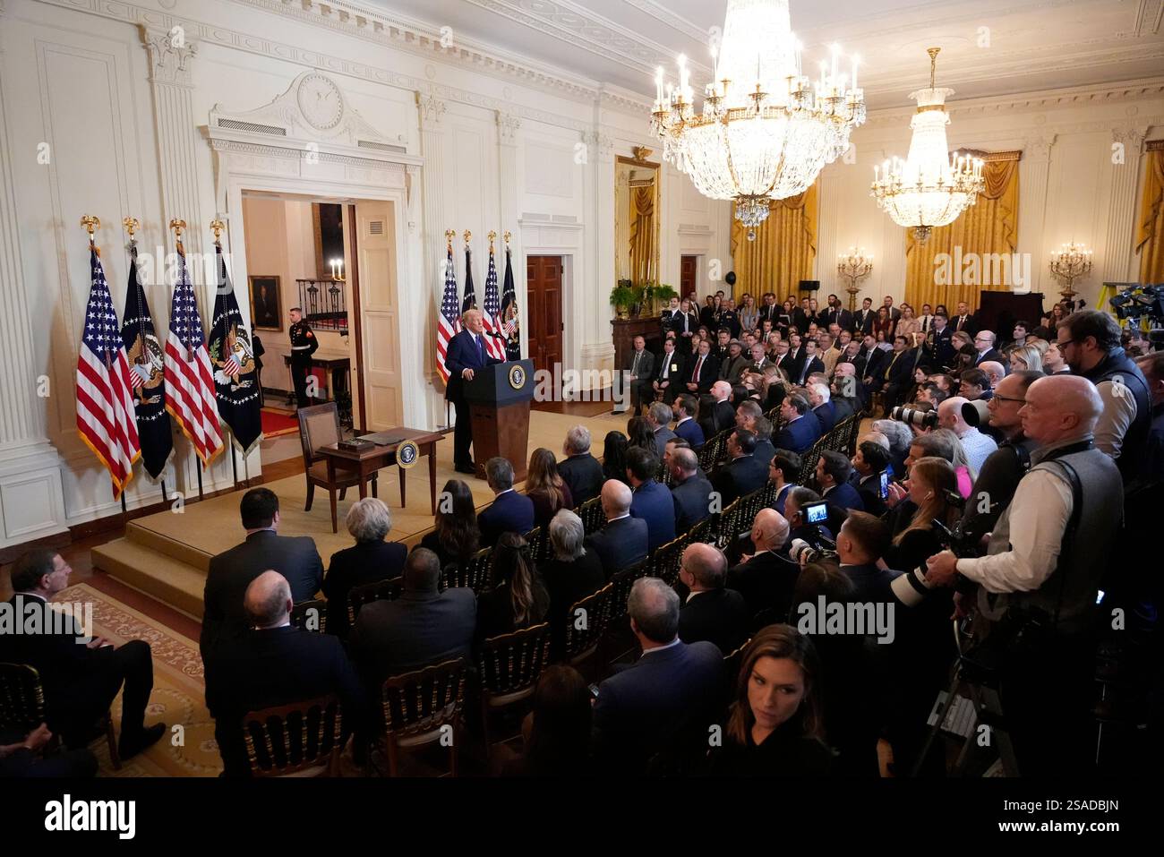 President Donald Trump speaks before signing the Laken Riley Act in the ...