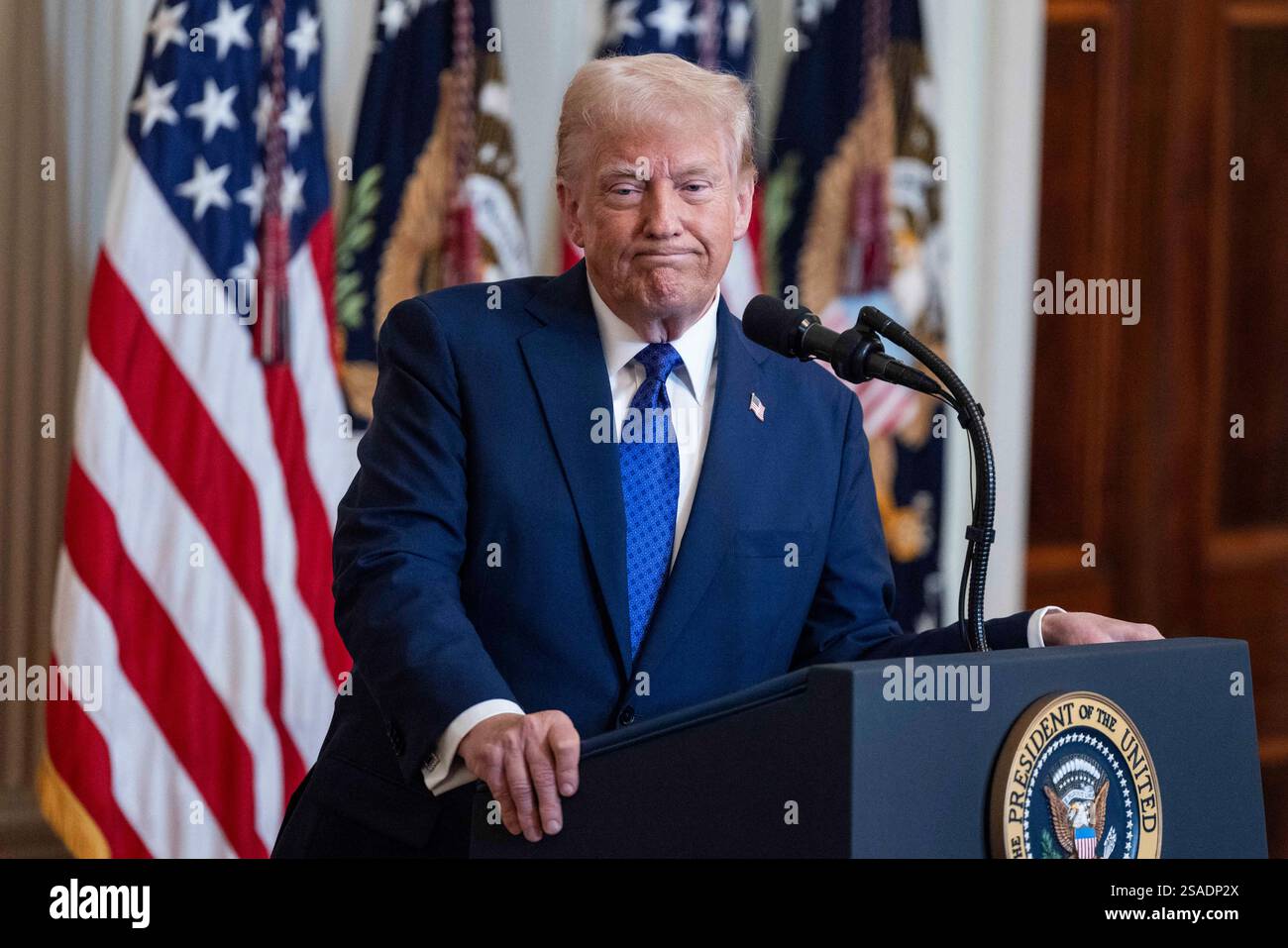 US President Donald Trump speaks before signing the Laken Riley Act in ...