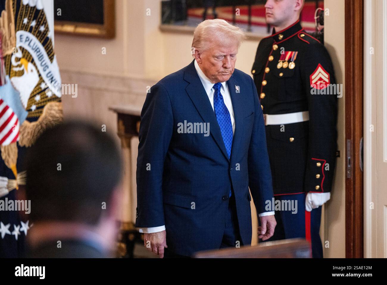 US President Donald Trump arrives to sign the Laken Riley Act in the ...