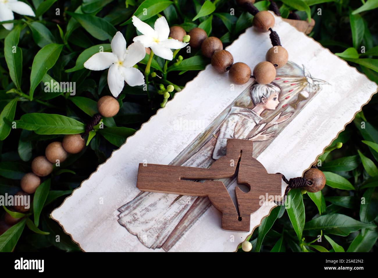 Pray in nature. Rosary and religious image  a natural plant.. Stock Photo