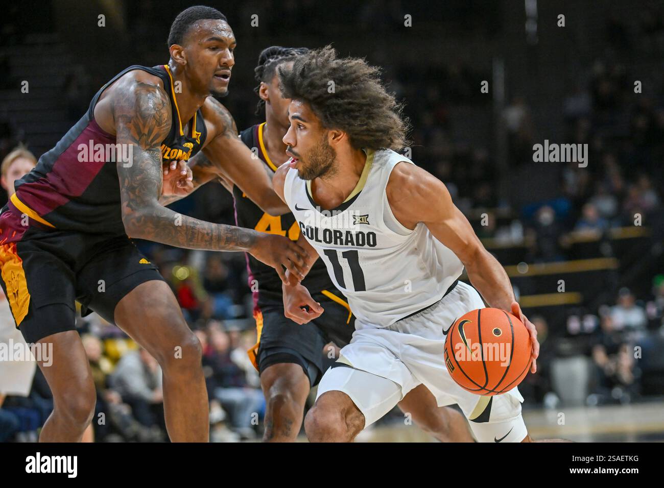 BOULDER, CO - JANUARY 28: Colorado guard Javon Ruffin (11) drives ...