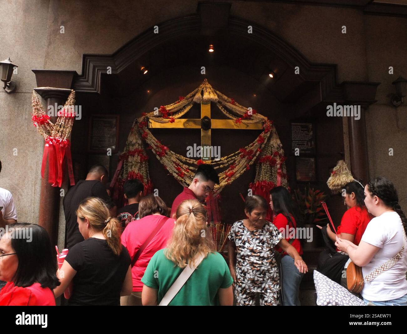 Manila, Philippines. 29th Jan, 2025. Filipino-Chinese light incense in an altar at Ongpin street in Chinatown. Filipinos celebrate Chinese or Lunar New Year in Manila Chinatown by buying ornaments for good luck, watching fire-eaters performances and, Lit incense. They believe it will bring luck and prosperity. Credit: SOPA Images Limited/Alamy Live News Stock Photo