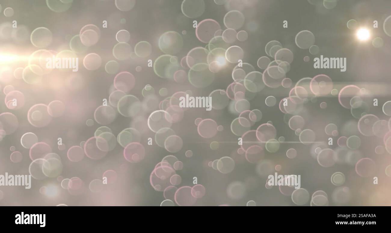 Soft bokeh lights image over blurred background with glowing circles Stock Photo
