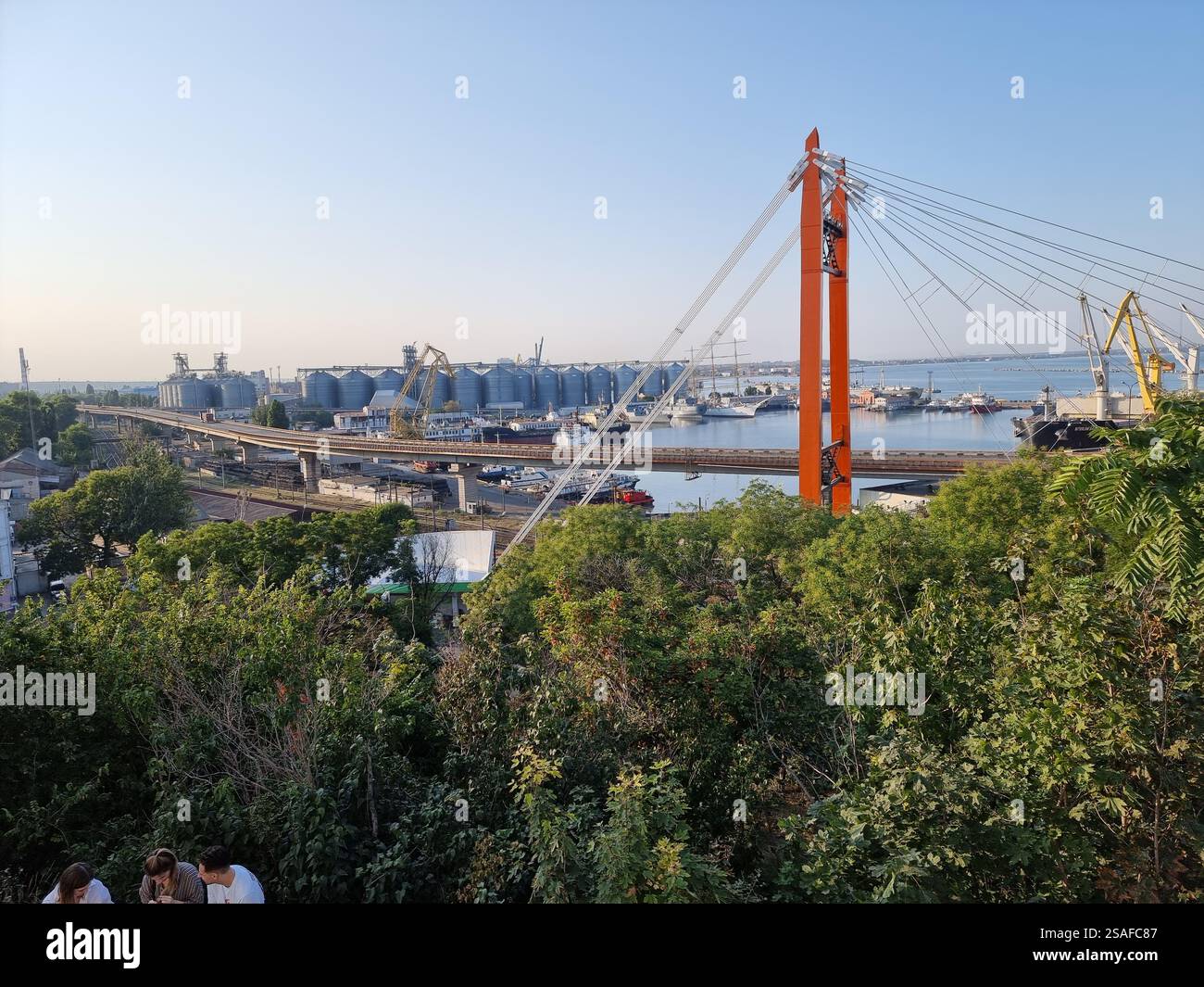 View on Odesa port with oil terminal and Viys'kovy descent bridge, red road bridge, Ukraine - Smartphone Captured Stock Image