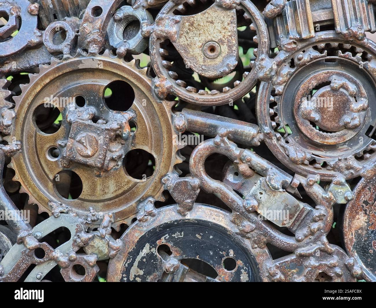 Closeup of the Monument to Steve Jobs in Odesa (Odessa ), Ukraine; a hand comprised of many metal gear wheels and other parts - Smartphone Captured Stock Image
