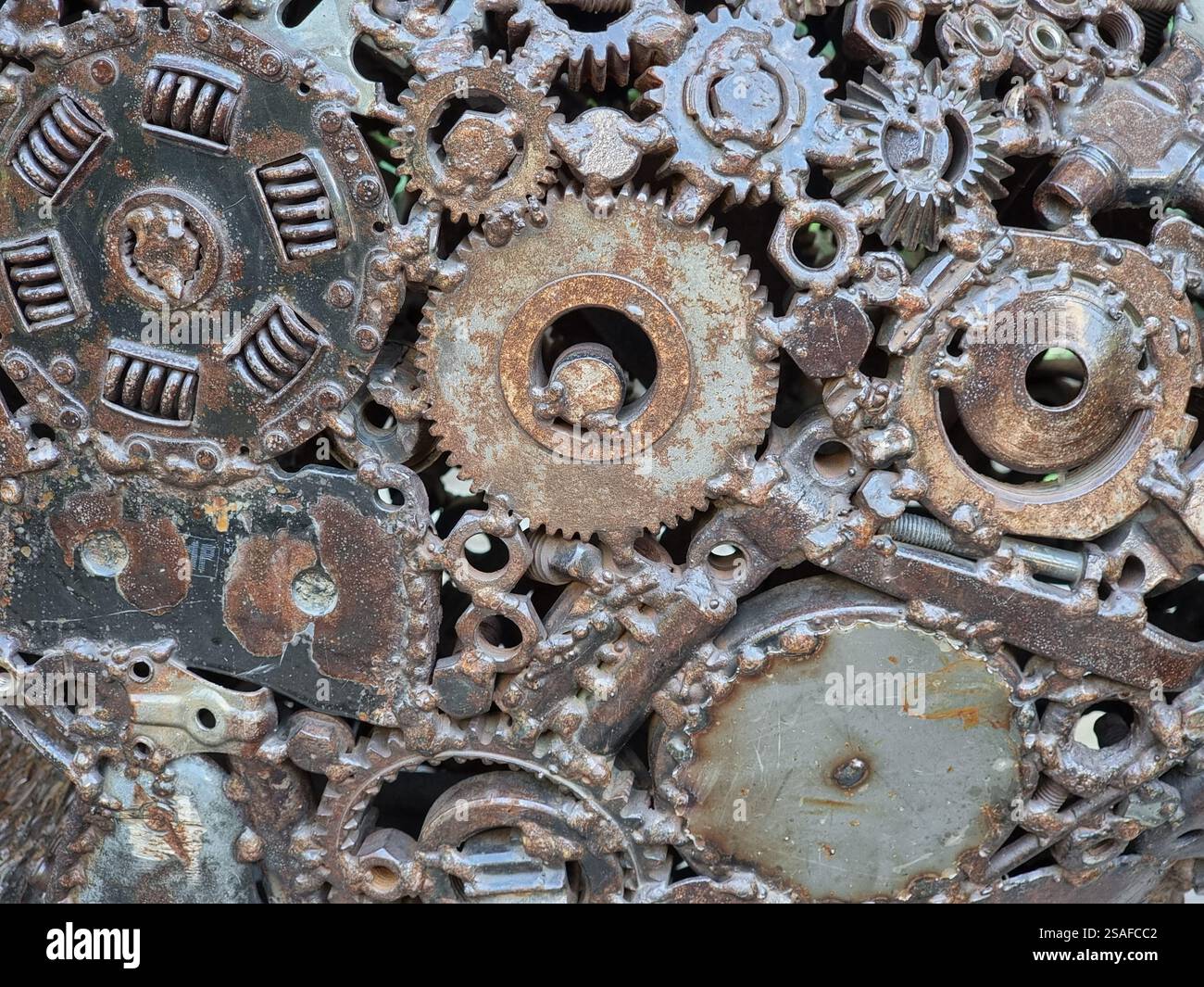 Closeup of the Monument to Steve Jobs in Odesa (Odessa ), Ukraine; a hand comprised of many metal gear wheels and other parts - Smartphone Captured Stock Image