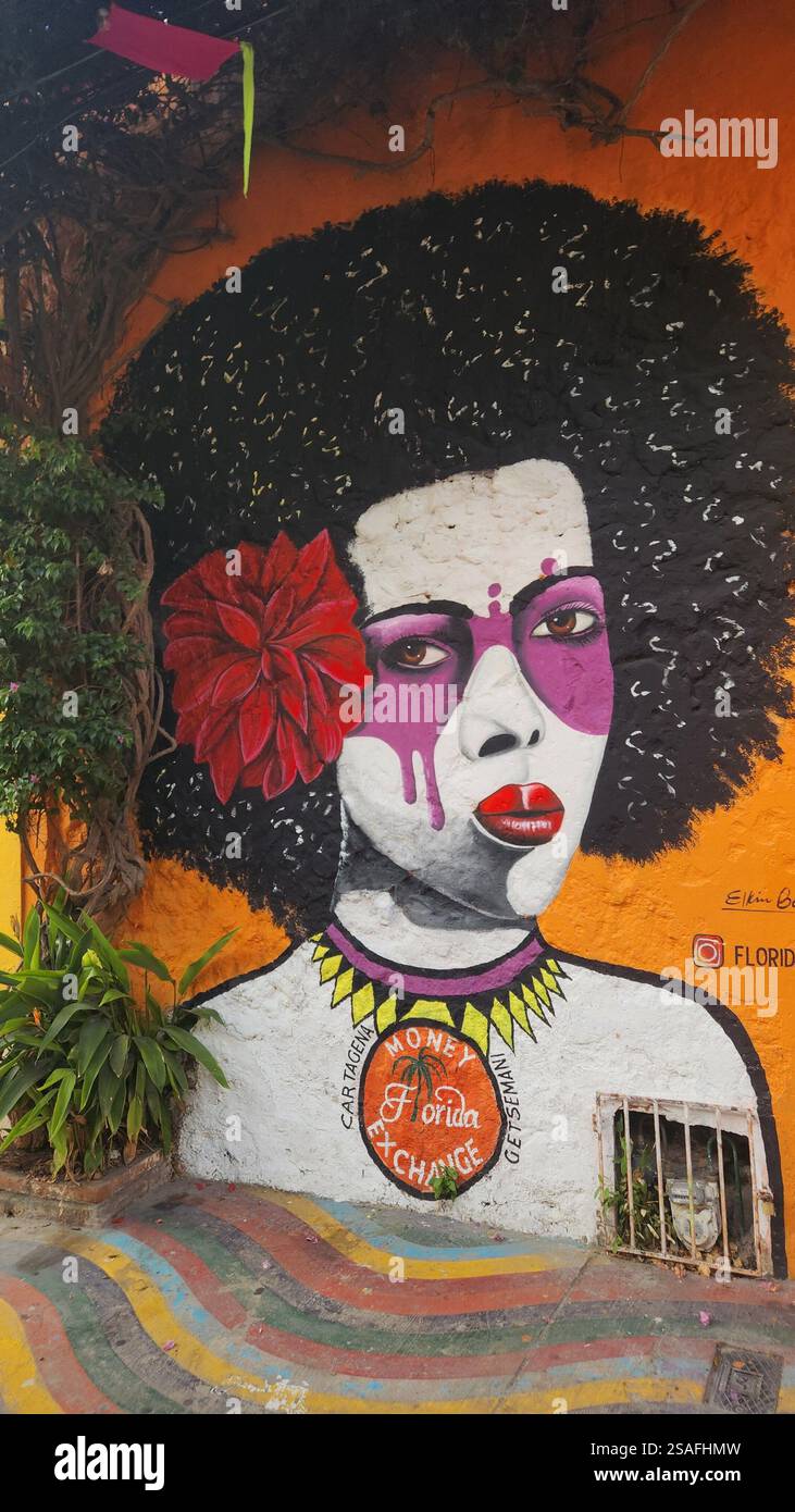 Barrio Getsemani Cartagena Colombia - Street Art Mural - Afro Woman / Mural de arte callejero: mujer con cabello afro - Smartphone Captured Stock Image