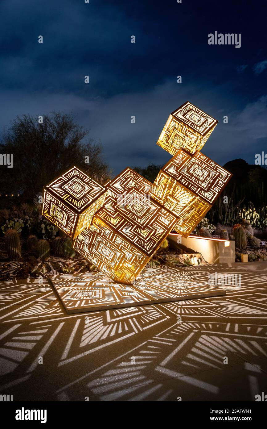A nighttime view of intricate geometric light sculptures by HYBYCOZO ...