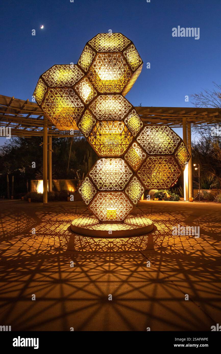 A nighttime view of intricate geometric light sculptures by HYBYCOZO ...