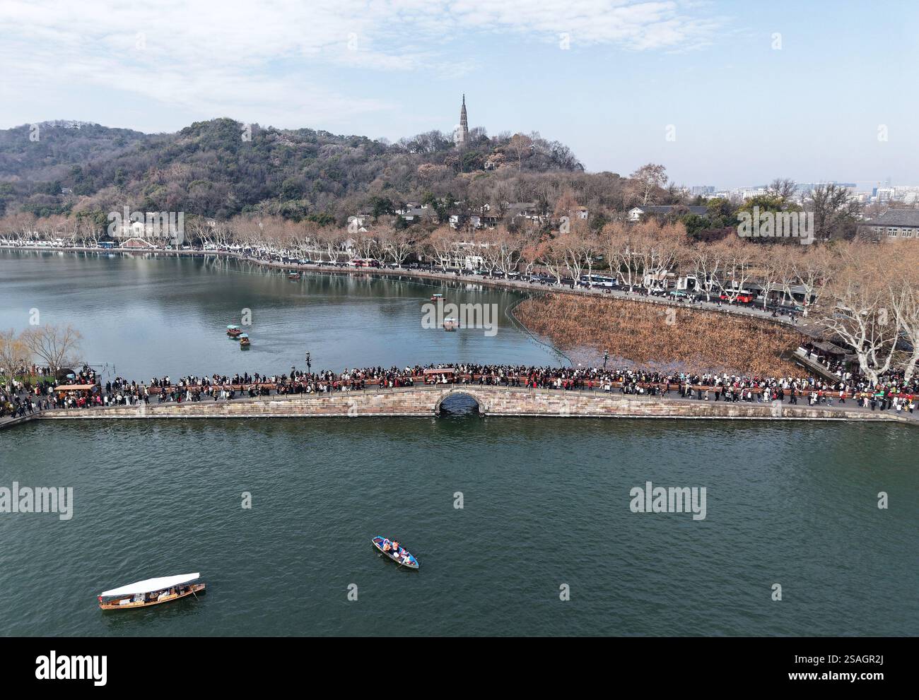 Tourists visit the West Lake scenic area during the Spring Festival