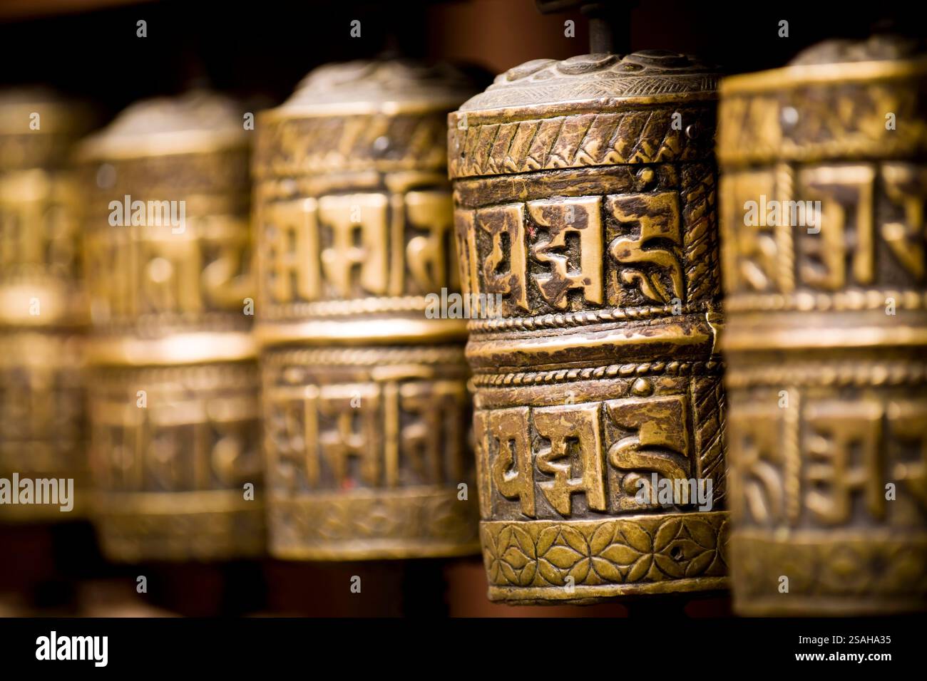 Jewell Script Bronze Tibetan prayer wheels or mani with the inscriptions in Sanskrit ...