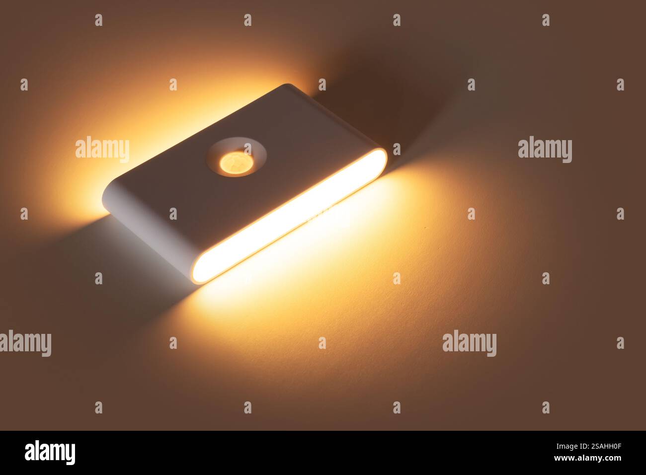 Small solar night led light with motion sensor Stock Photo