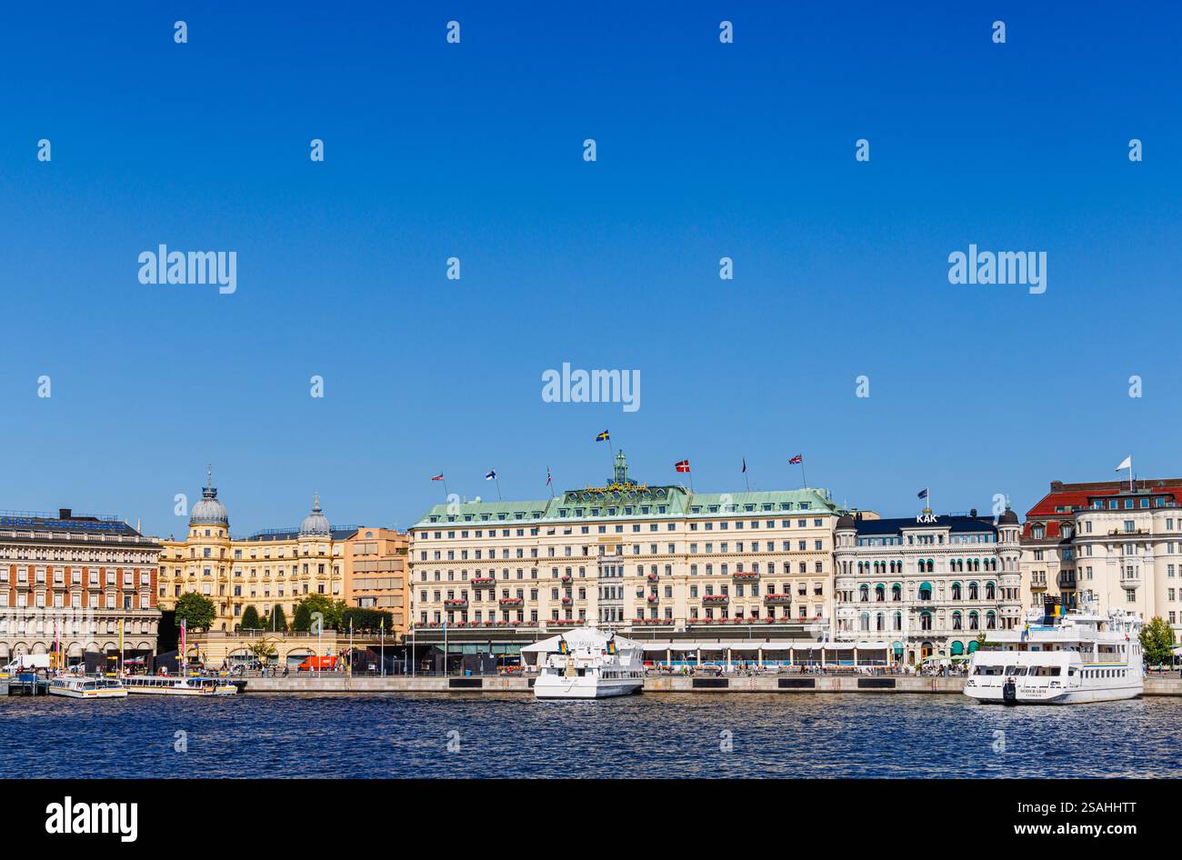 View from Gamla stan (Old Town) over Stockholm Strom to Stadsholmen and the Grand Hotel 5 star waterfront hotel in Stockholm, capital city of Sweden Stock Photo