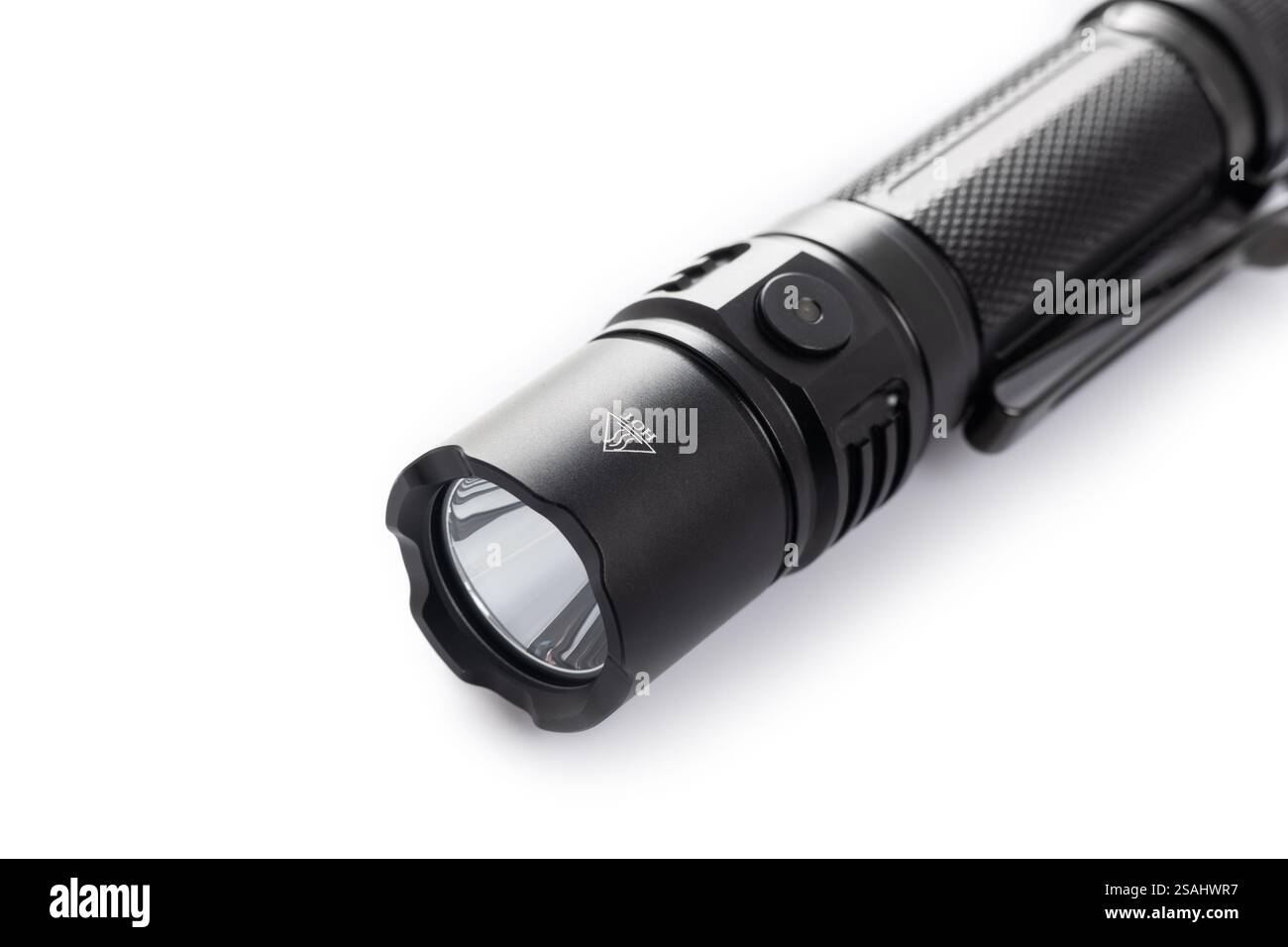black rechargeable electric LED flashlight isolated on white background. Stock Photo