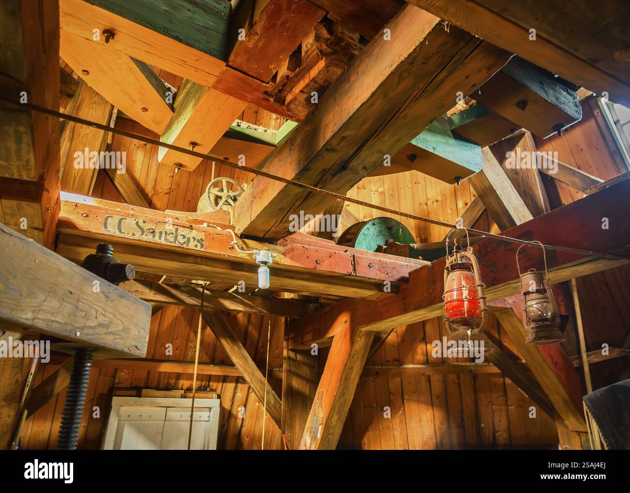 Close-up of the wooden gears and beams inside windmill De Korenbloem in ...