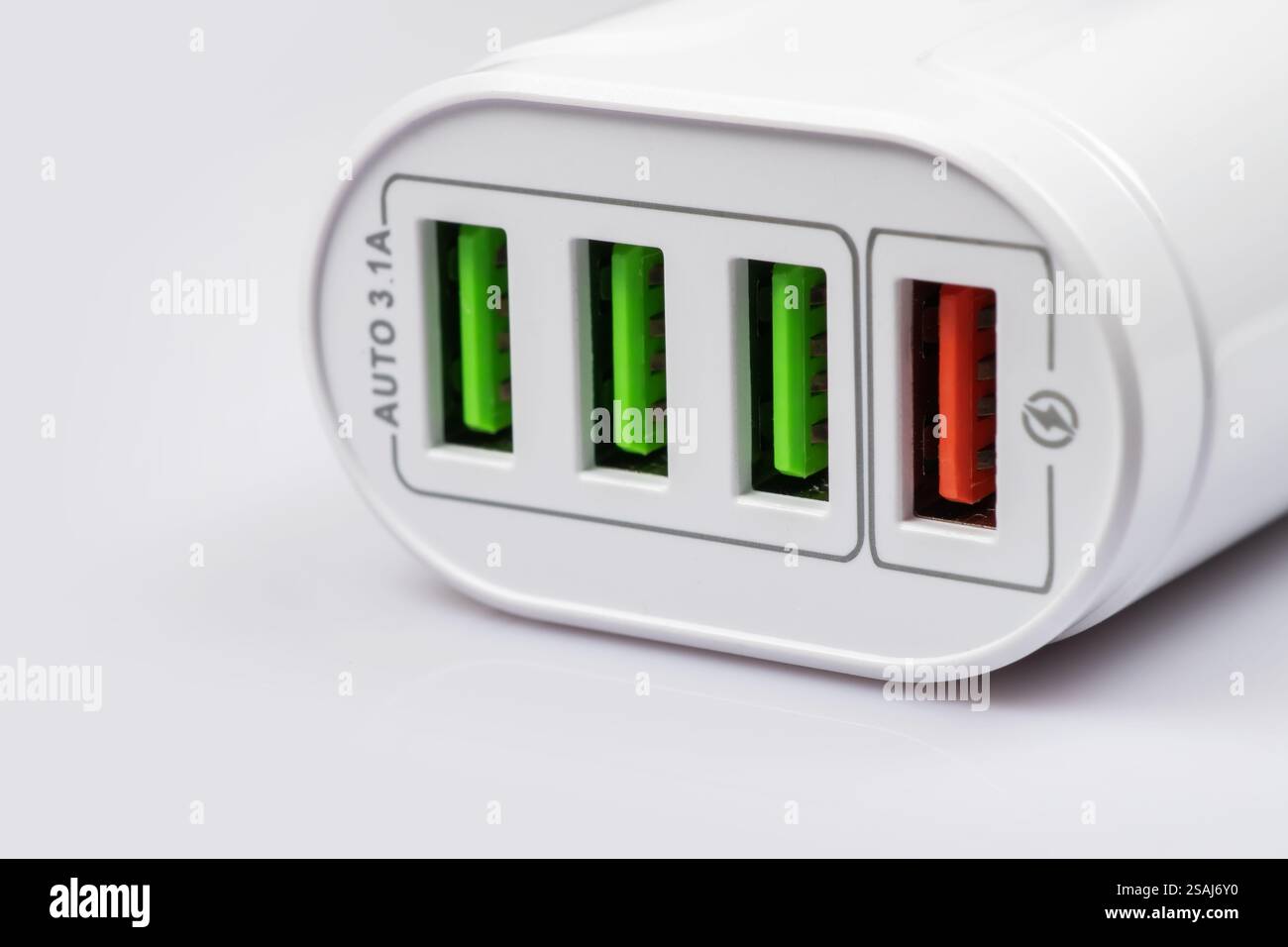 mobile phone charger on white background, studio shot. Stock Photo