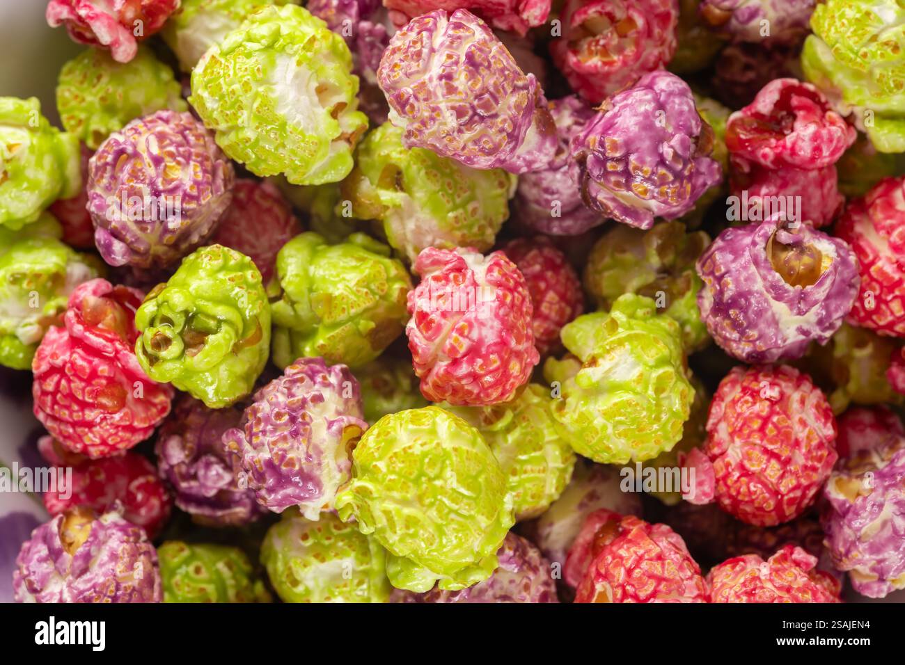 Colorful candy popcorn making a background. close up Stock Photo