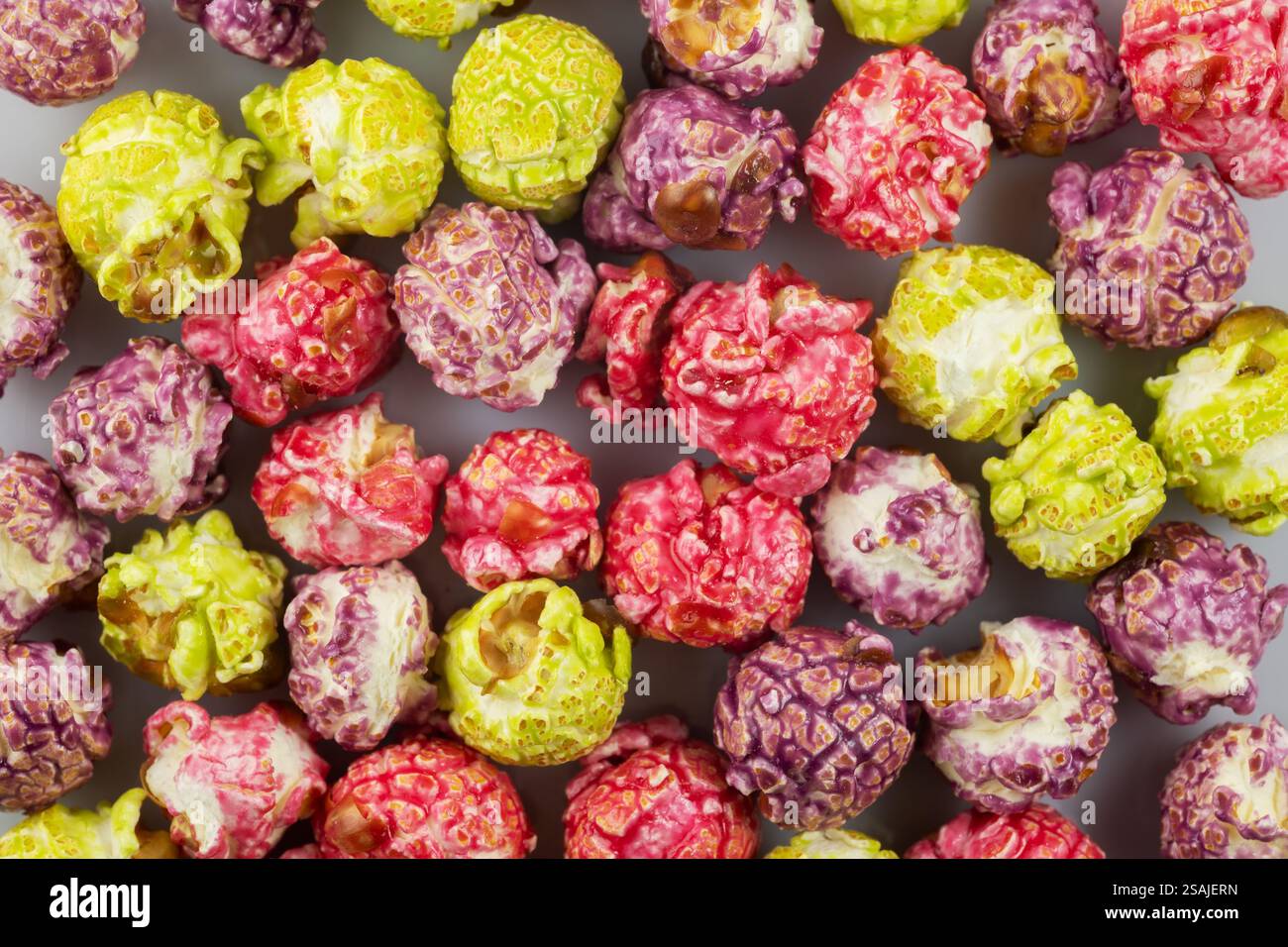 Colorful candy popcorn making a background. close up Stock Photo