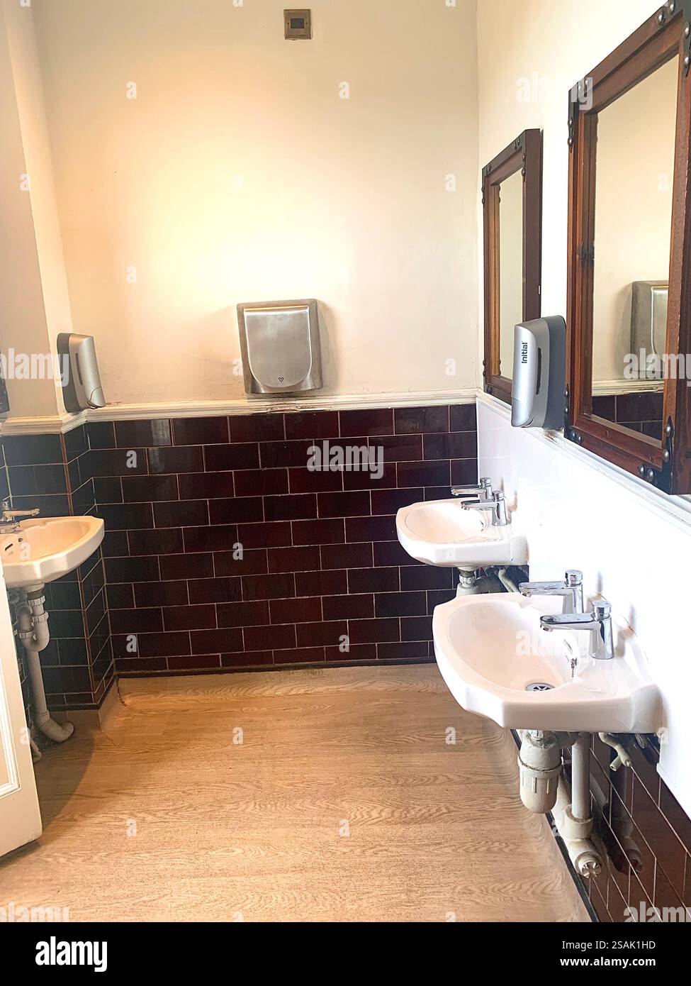 Cow and Calf pub Restaurant Ilkley Moor food drink old style type Hotel  rest eating inside fashioned fireplace Winter cold weather staff tables table - Smartphone Captured Stock Image